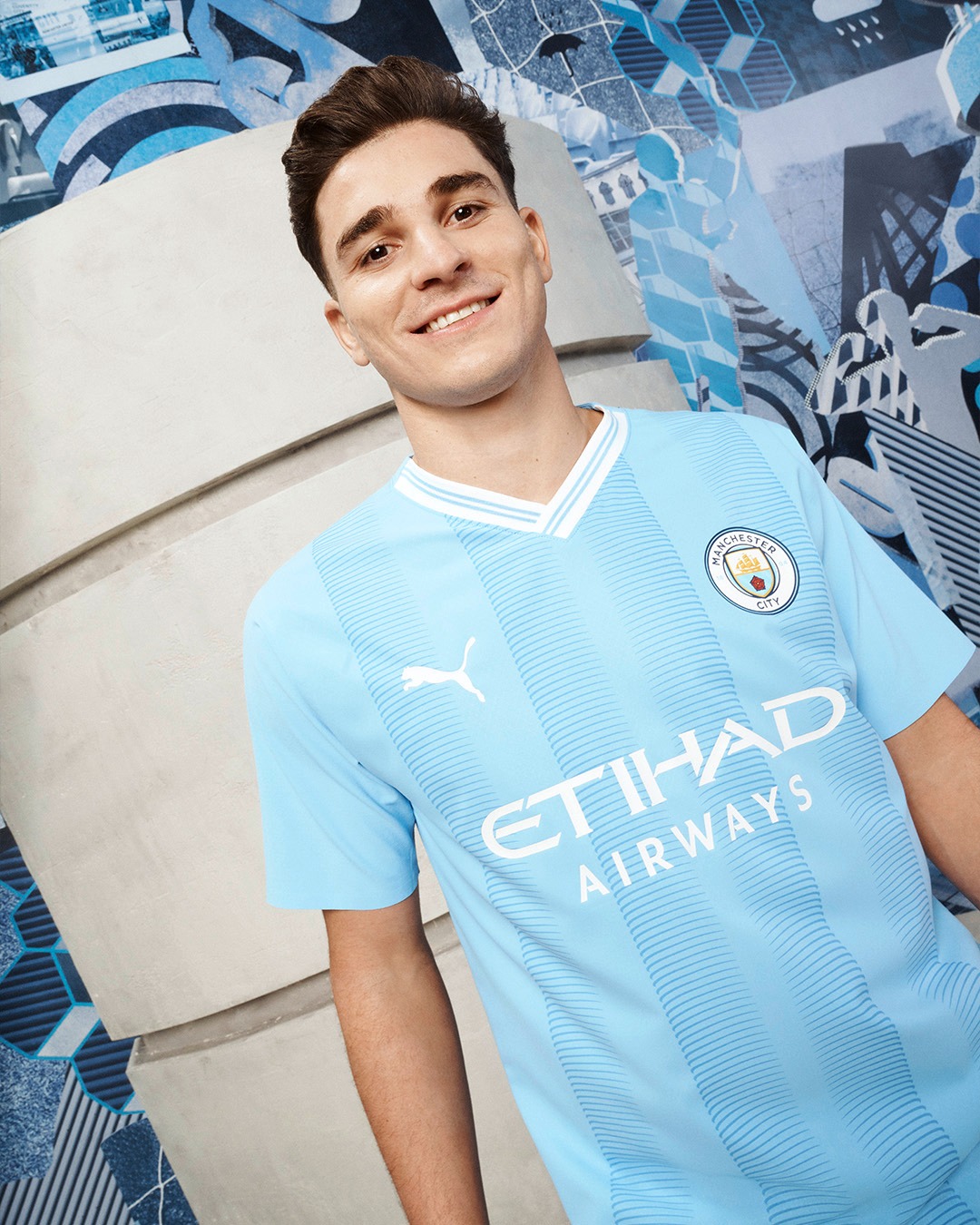 881_manchester_city_2023_24_puma_home_kit_b.jpg